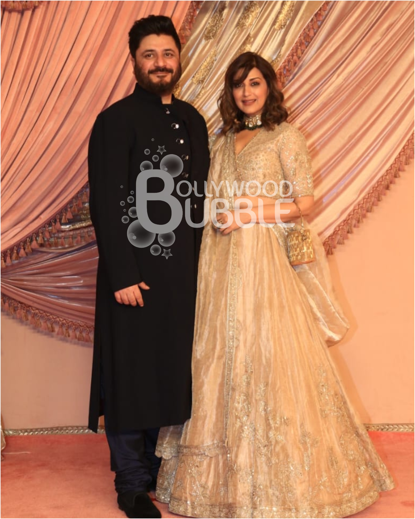 Sonali Bendre with her husband at the Sangeet ceremony of Anant Ambani and Radhika Merchant