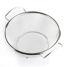 Colander on white background