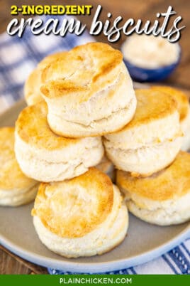 Plate of cream cookies stacked on top of each other