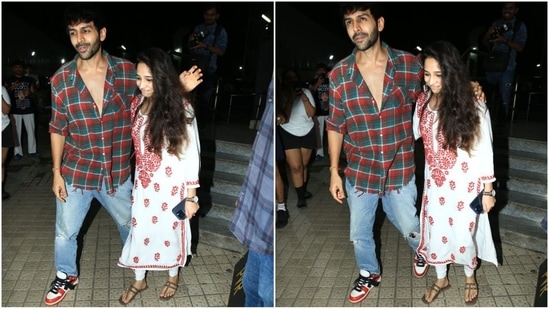 Kartik Aaryan effortlessly blends casual with cool on his latest outing with his sister. He was seen sporting an oversized open-button shirt with bold green and red checks, which gives off a laid-back yet stylish vibe. Pairing his look with trendy colour-block sneakers and a rugged bearded look, Kartik once again proves that he has the casual street style down pat. (HT Photo/VarinderChawla)