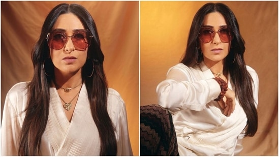 With the help of makeup artist Divya Arth Shetty, Karisma accessorized with nude eyeshadow, winged eyeliner, mascara-coated lashes, blushed cheeks, luminous highlighter and a nude lipstick shade. (Instagram/@therealkarismakapoor)