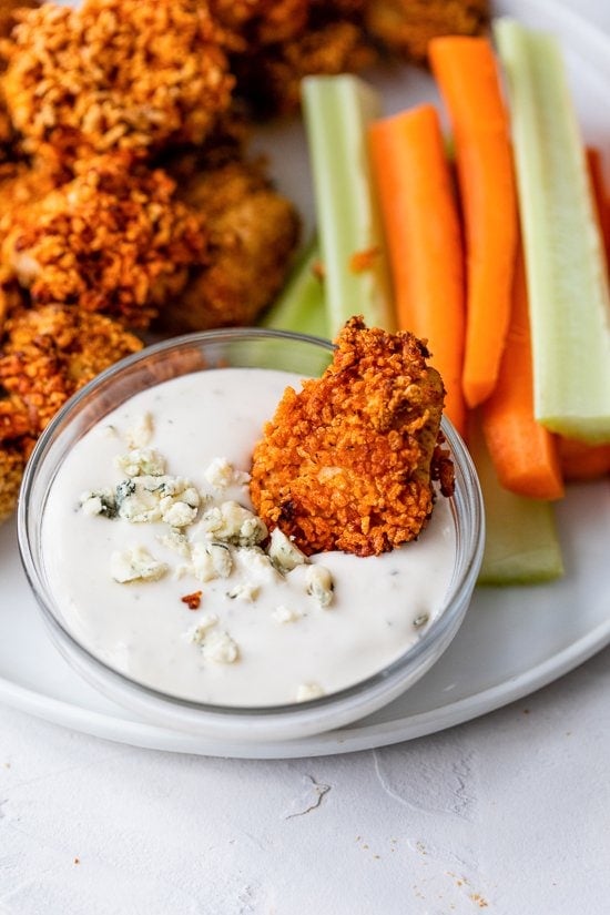 Crispy and spicy Air Fryer Buffalo Chicken Nuggets are perfect for the big game or to enjoy for lunch or dinner.