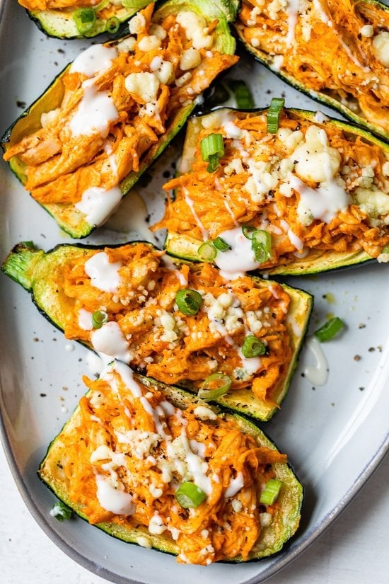 You won't miss the carbs in these low carb zucchini skins loaded with buffalo chicken and cheese made in the air fryer!