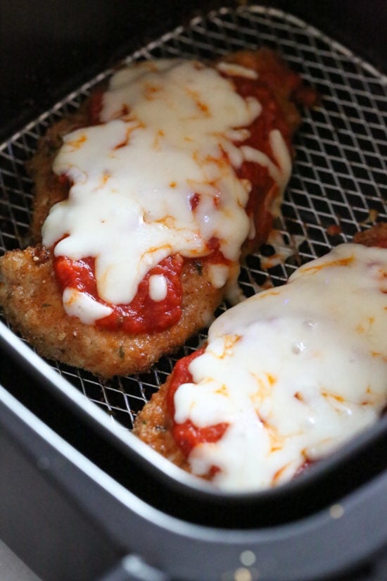 Chicken Parmesan turns out juicy and delicious in the Air Fryer, without using so much oil!