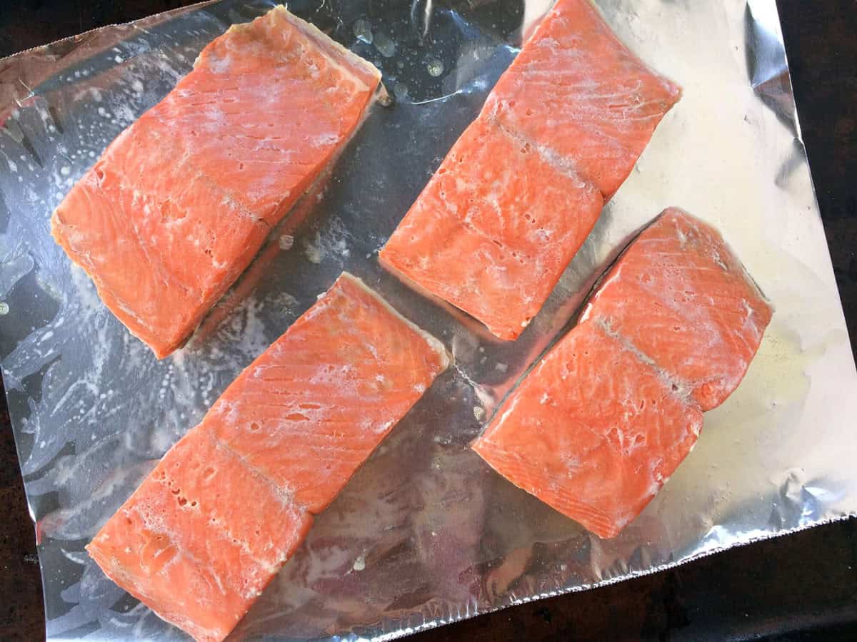 Salmon fillets on a baking tray