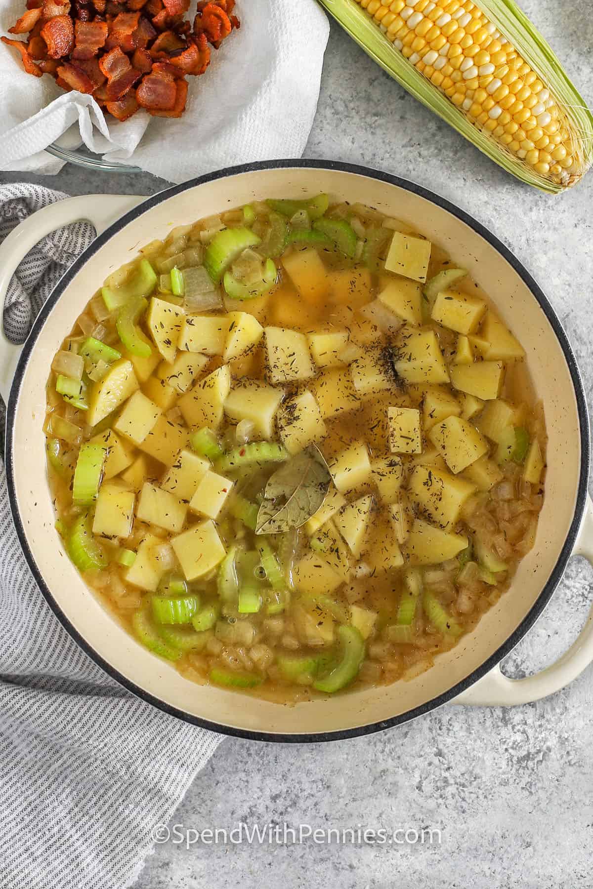 Cook potatoes with onions, celery, broth and seasonings to make an easy homemade corn chowder