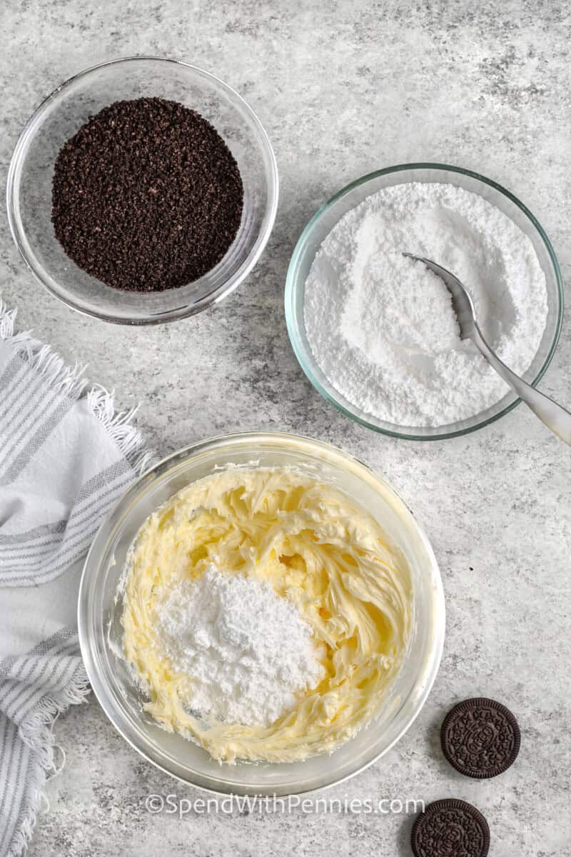 Adding powdered sugar to butter to make Oreo frosting