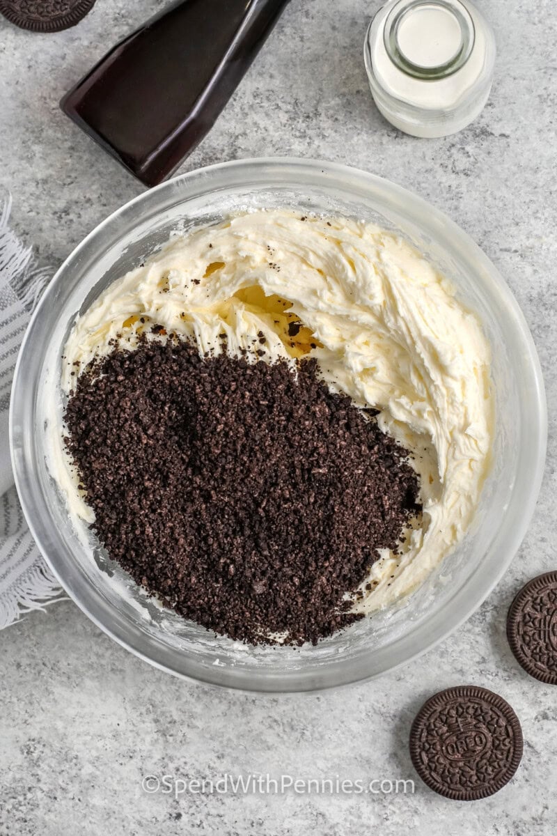 adding ingredients together to make Oreo frosting