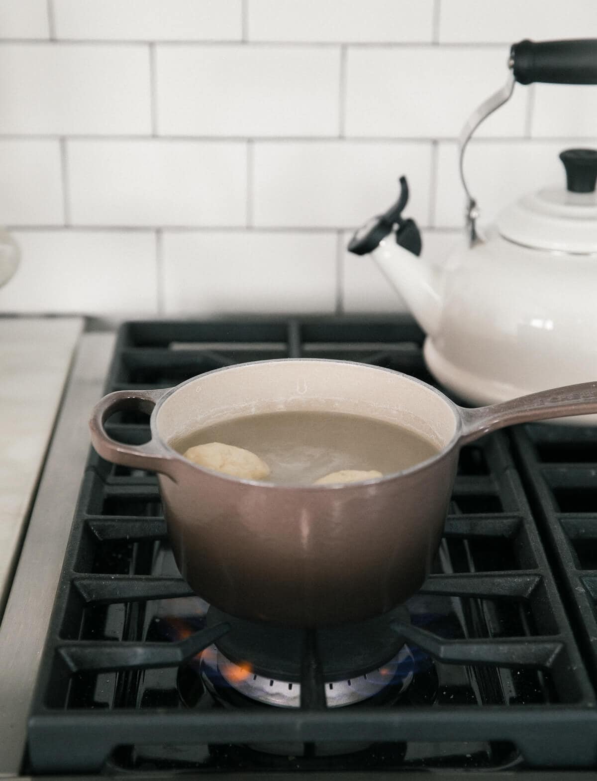 Boiling dough in water on the stove.