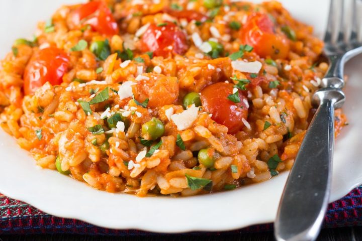 Make the most of summer tomatoes with this roasted tomato and pea risotto recipe from Erren's Kitchen. This Italian classic is topped with a drizzle of balsamic vinegar and grated parmesan.