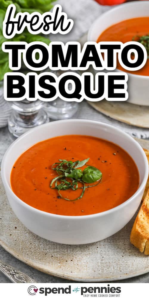 Fresh tomato bisque in a bowl with a caption