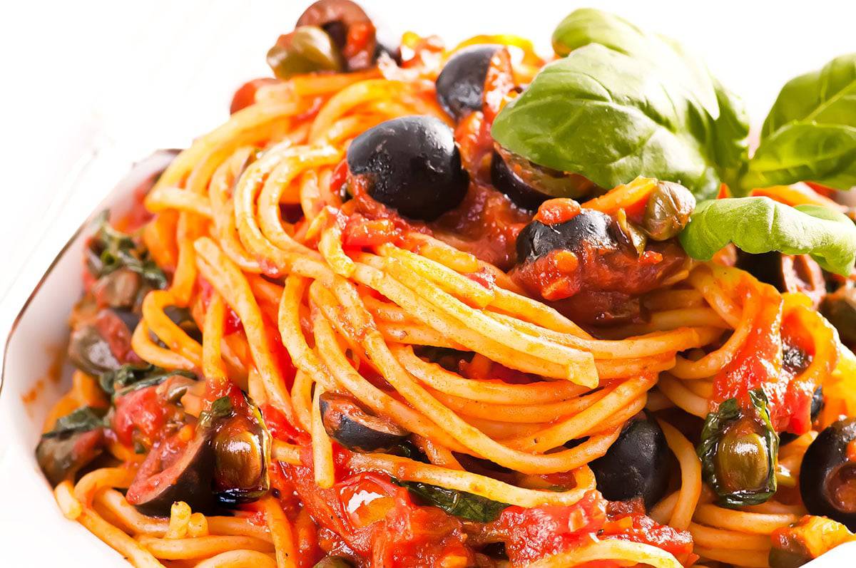 Spaghetti alla puttanesca freshly served and ready to eat