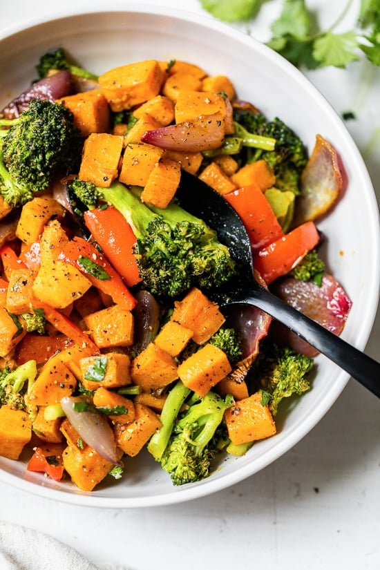 This nutritious Warm Curry Roasted Vegetable Salad with Curry Honey Dressing makes a delicious vegetarian, gluten-free, dairy-free dinner or make-ahead lunch.