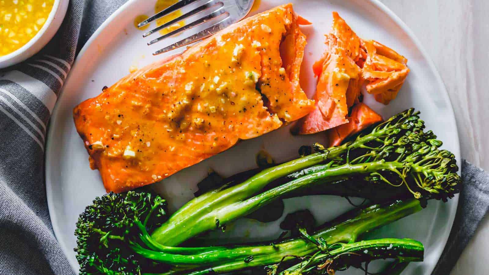 Air Fryer Frozen Salmon Fillet with Maple Mustard and Broccolini on a Plate.