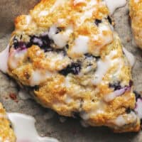 Overhead view of a glazed blueberry muffin