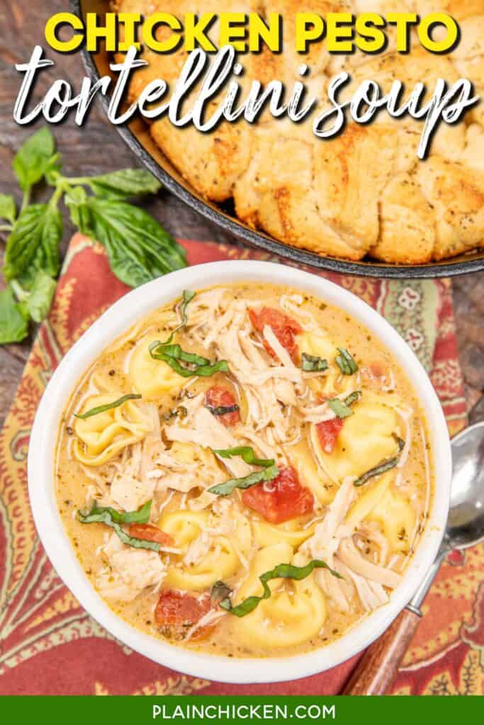 Bowl of chicken tortellini soup topped with basil and text overlay