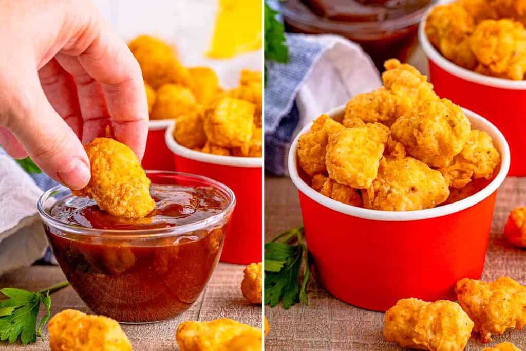 Close-up of golden, crispy chicken nuggets served in a red cup. On the left, a hand is dipping a nugget into a bowl of a dark, rich dipping sauce. Fresh parsley leaves are scattered throughout, enhancing the presentation.