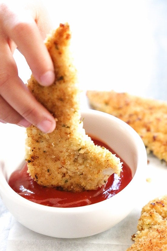 These juicy and flavorful chicken strips are marinated in pickle juice, then breaded and baked in the oven or air fryer!