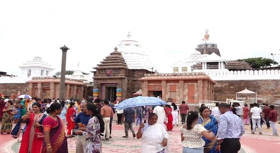 **EDS: SCREENSHOT VIA PTI VIDEOS** Puri: Devotees gather outside the Jagannath Temple in Puri on Saturday, July 13, 2024. The 'Ratna Bhandar' of the temple will be reopened on Saturday after 46 years. (PTI Photo)