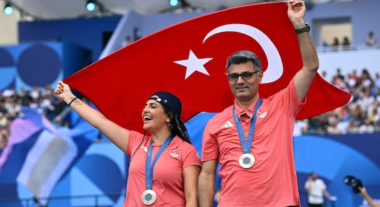 Turkish shooter Yusuf Dikec (right) gained immense popularity on social media during the Paris Olympics. 