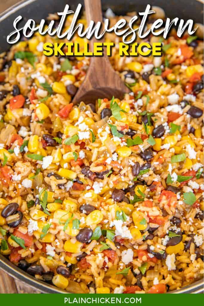 Spoonful of rice with black beans, peppers and skillet corn