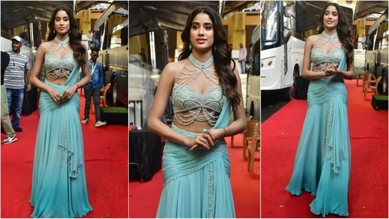 Janhvi Kapoor rocked the apsaracore trend with her latest look, sporting a blue lehenga saree paired with a pearl-studded blouse and a flowing skirt, exuding elegance and grace. (HT Photo/VarinderChawla)