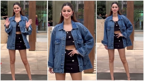 Bae is back with another glamorous look. This time, Ananya Panday dazzles in a black ensemble comprising a bralette top and a mini skirt embellished with extravagant silver embellishments. Paired with an oversized denim jacket and silver hoop earrings, she exudes effortless glamour. (HT Photo/VarinderChawla)