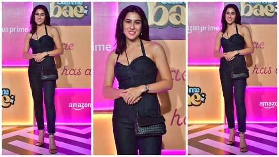 Sara Ali Khan dazzled in a halterneck, backless denim jumpsuit. She accessorized her look with a black crossbody bag, high heels and fresh makeup, looking effortlessly chic. (HT Photo/VarinderChawla)