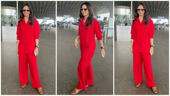 Rakul Preet Singh masters the monochrome trend with her latest airport look, flaunting a red ensemble paired with black sunglasses and flats for a casual look. (Instagram)