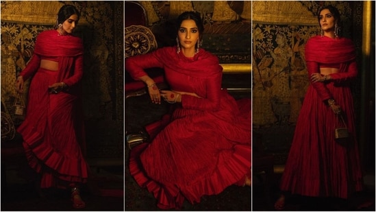 Sonam Kapoor dazzled in a stunning red ensemble designed by Abu Jani and Sandeep Khosla. The outfit featured an ankle-length pleated skirt in luxurious crushed silk, paired with a dramatic cross-back cropped choli and long gold jhumkas for a touch of sparkle. (Instagram)