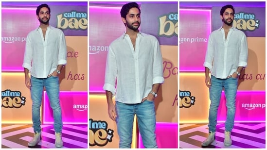 Archies actor Agastya Nanda opted for a minimal yet stylish look in a white shirt with folded sleeves and skinny jeans. He completed his look with white shoes, which completed his ensemble in a casual style. (HT Photo/VarinderChawla)