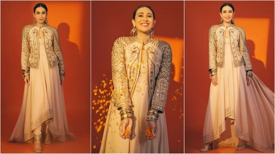 Karisma Kapoor stuns in an ivory anarkali kurta with an uneven hem, paired with a chic mirror-embellished jacket, blending traditional with modern style. (Instagram)