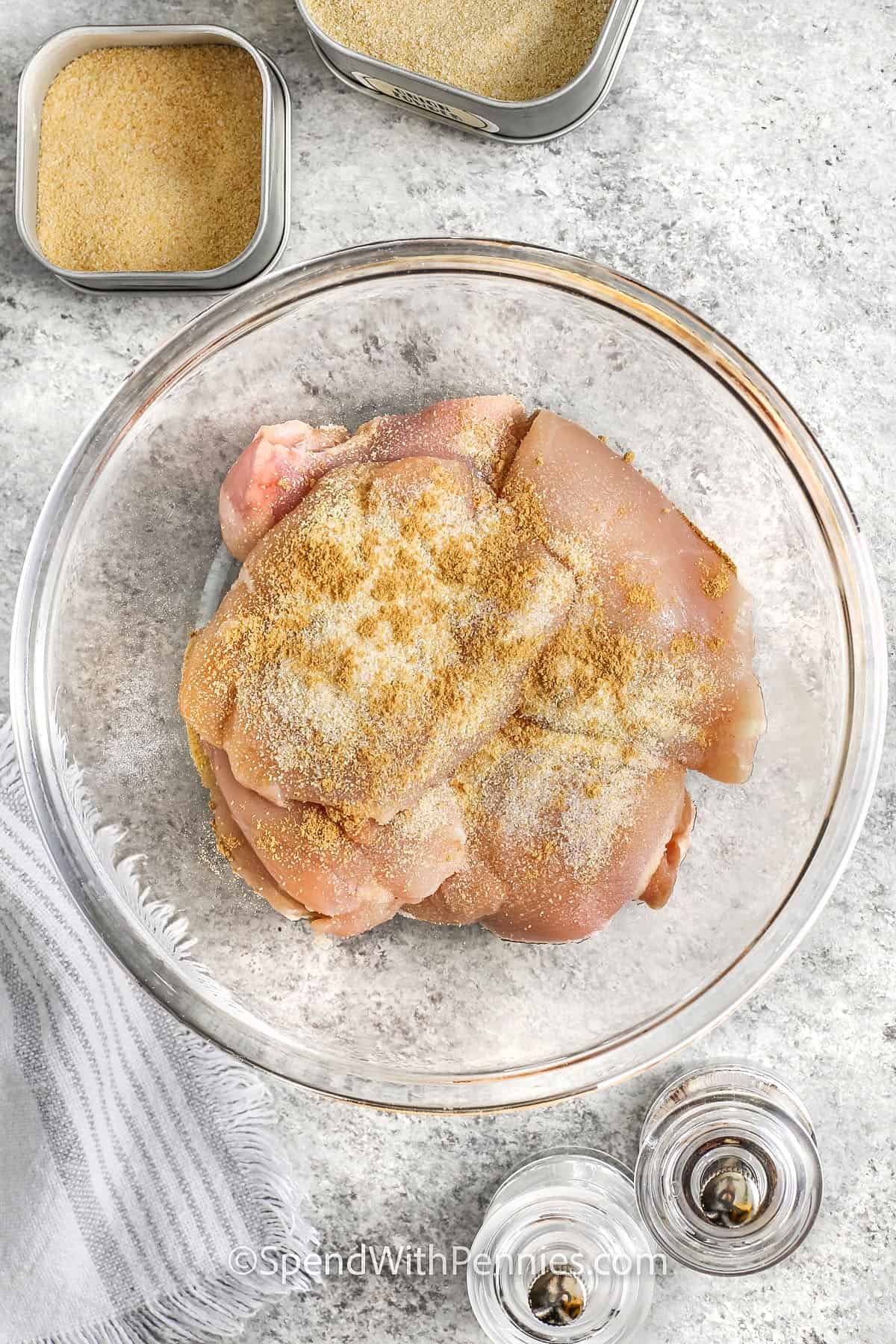 Seasoning the chicken to make Apricot Chicken