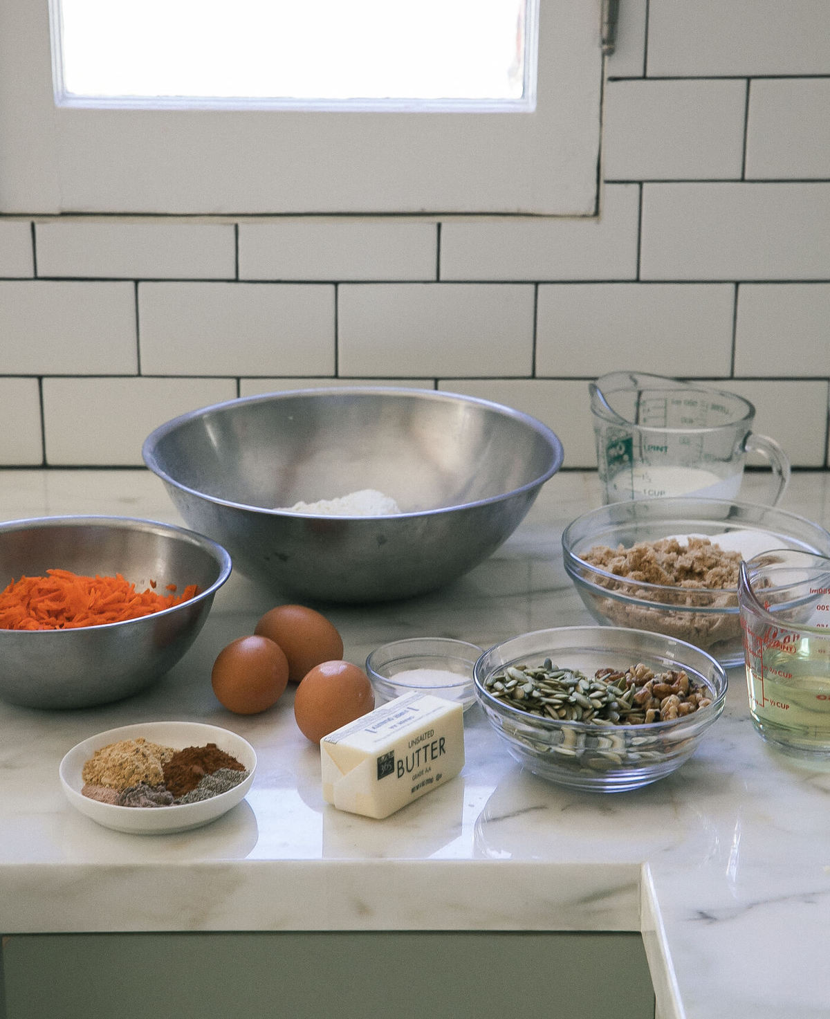 Side view of cupcake ingredients on a counter. 