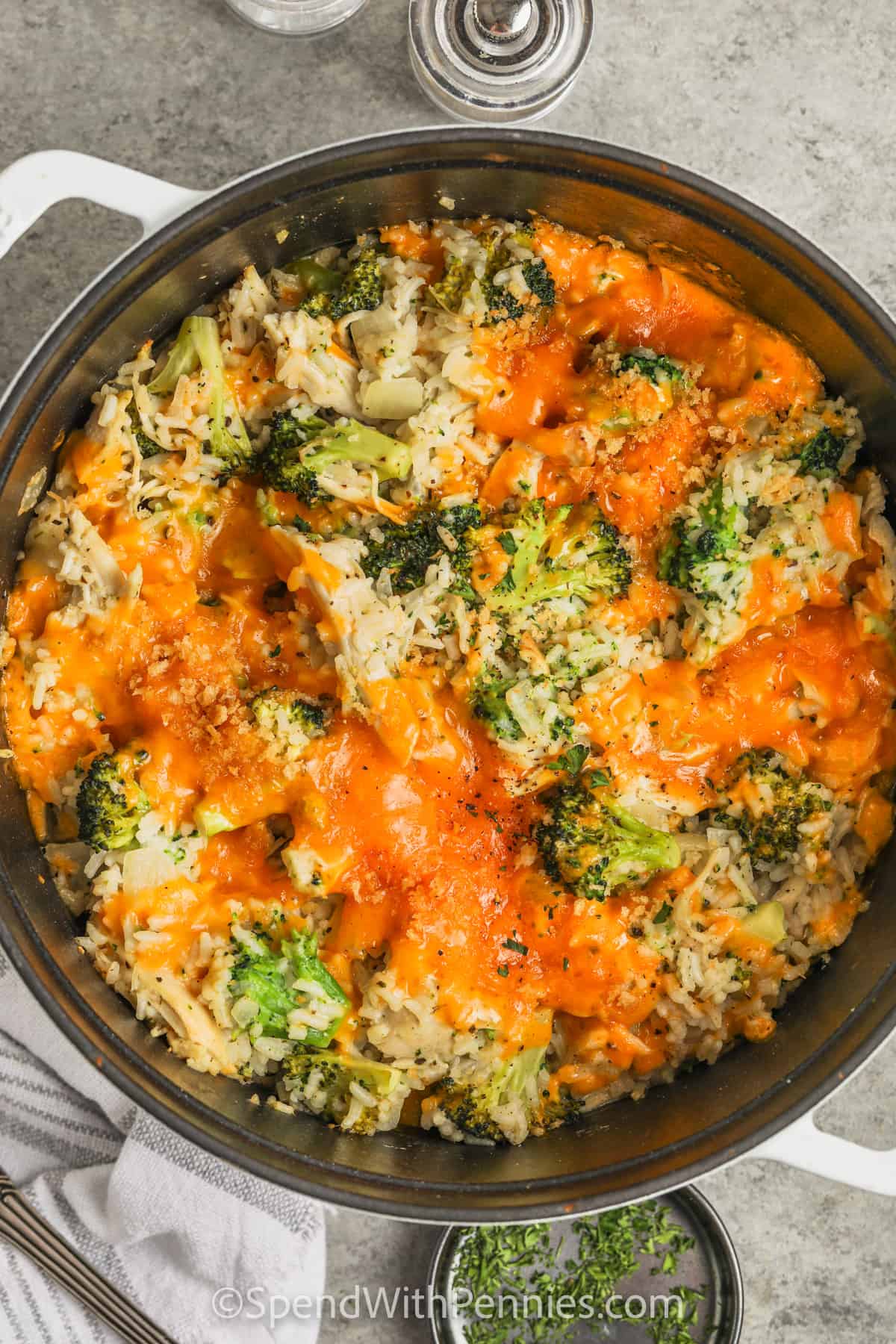 Chicken and broccoli rice casserole topped with cheese