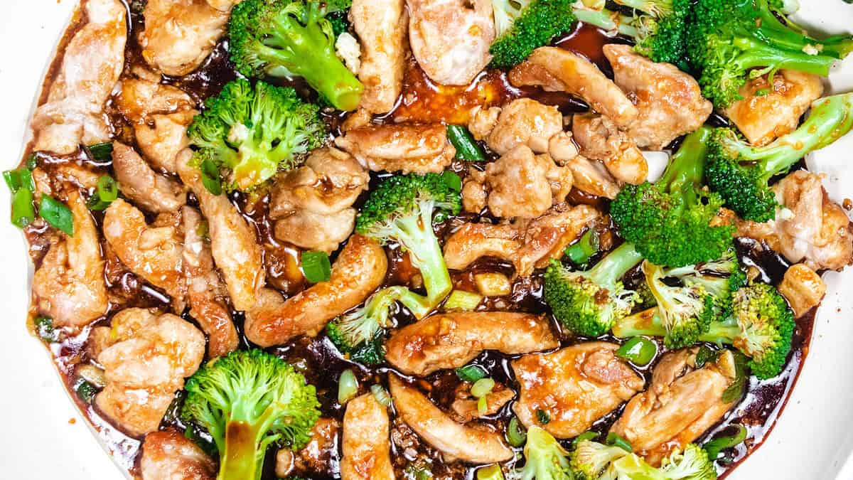 Chinese chicken and broccoli cooked in a pan ready to serve.