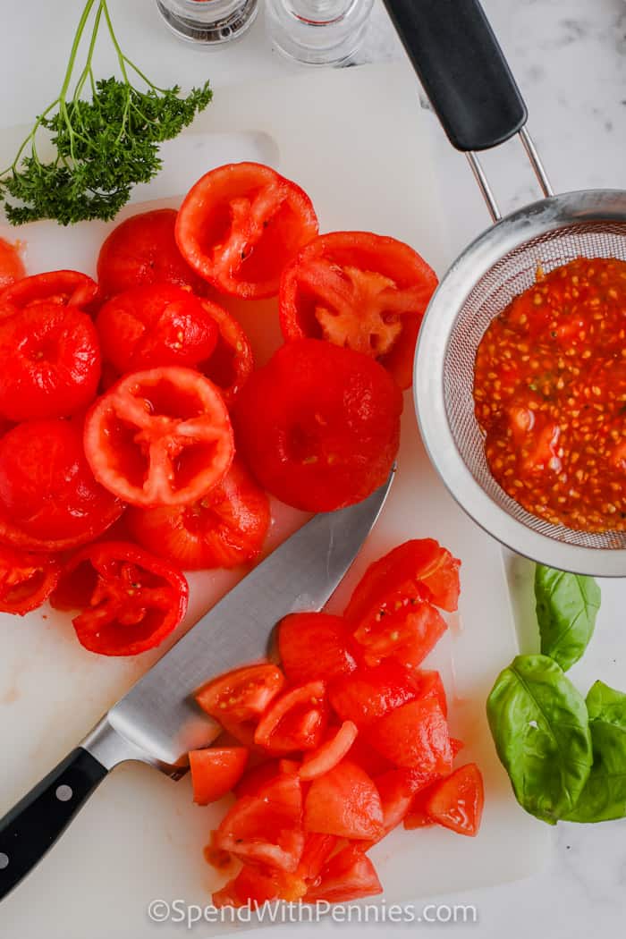 Slice tomatoes to make fresh tomato sauce