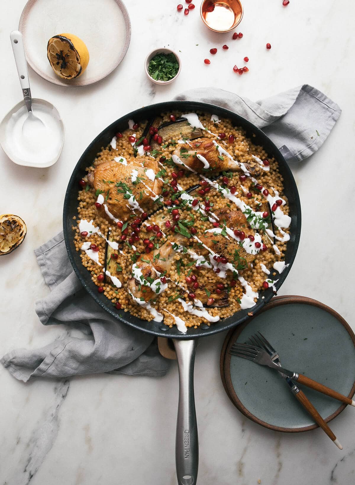 Overhead view of a skillet chicken dinner.