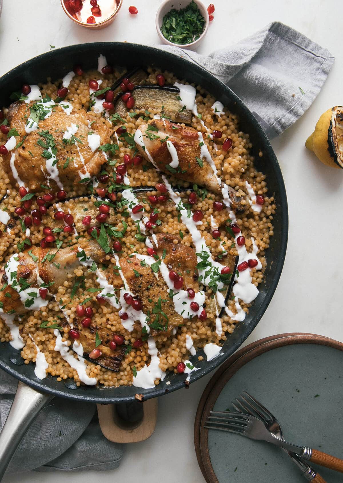 Close up image of Harissa Chicken Couscous in a pan. 