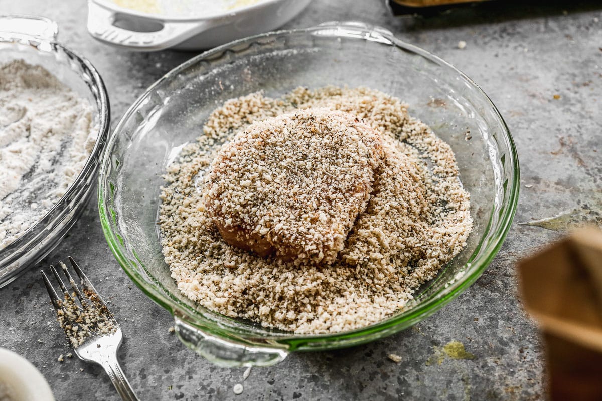 Coat pork chops in breadcrumbs to make breaded pork chops