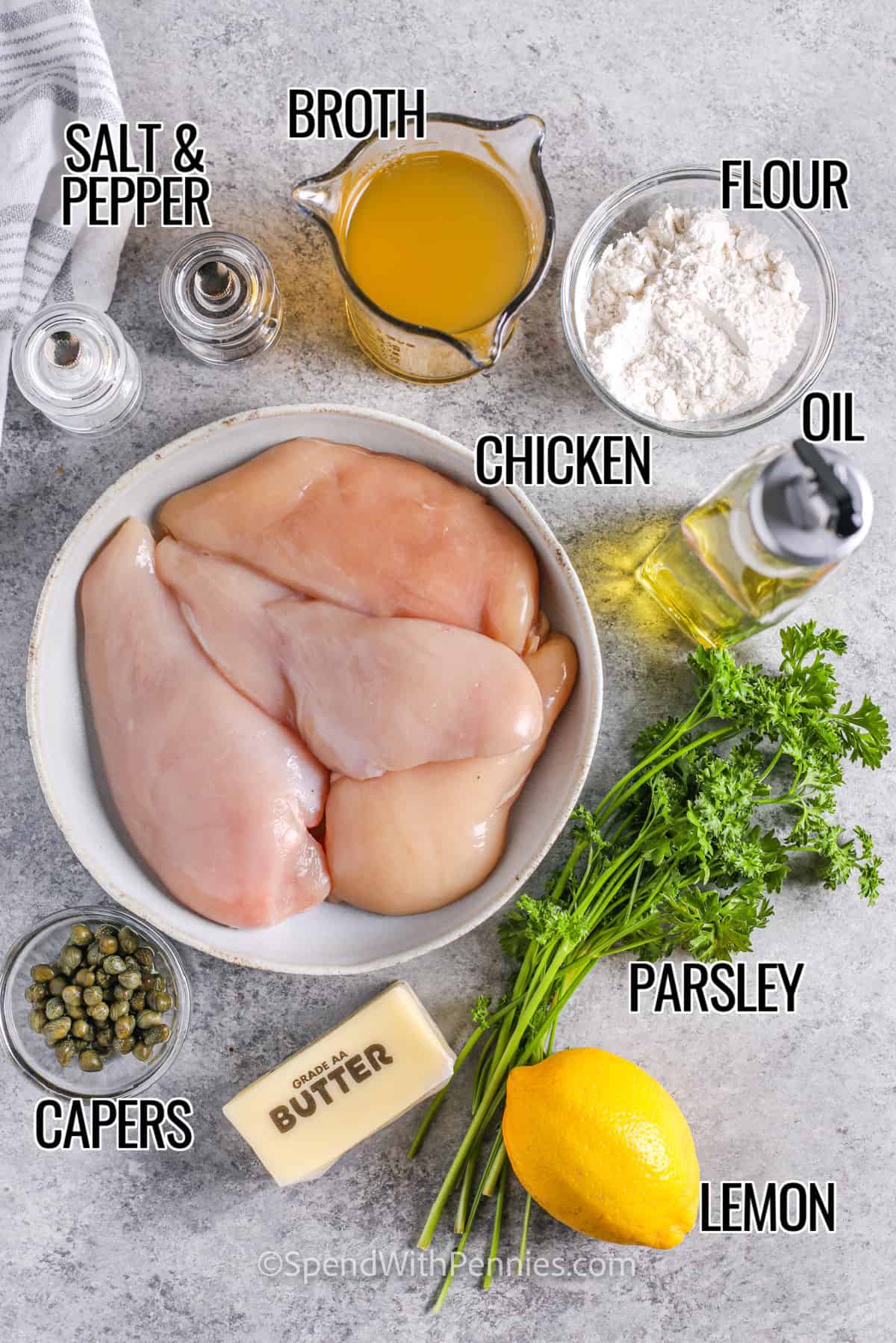 Chicken, capers, parsley, lemon, oil, broth and seasonings to make Chicken Piccata with labels