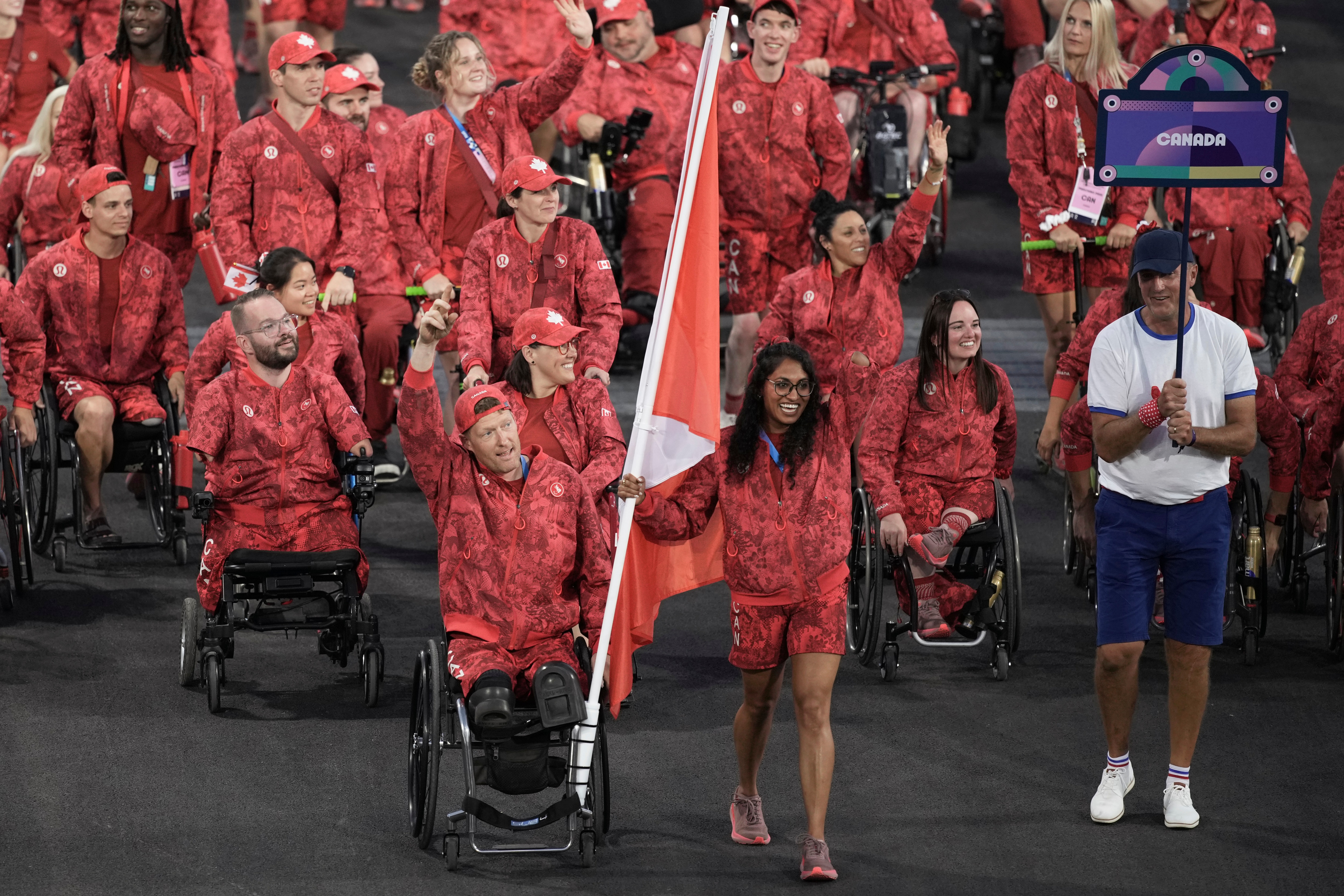 Canadian athletes parade during the opening ceremony of the 2024 Paralympic Games. (AP)