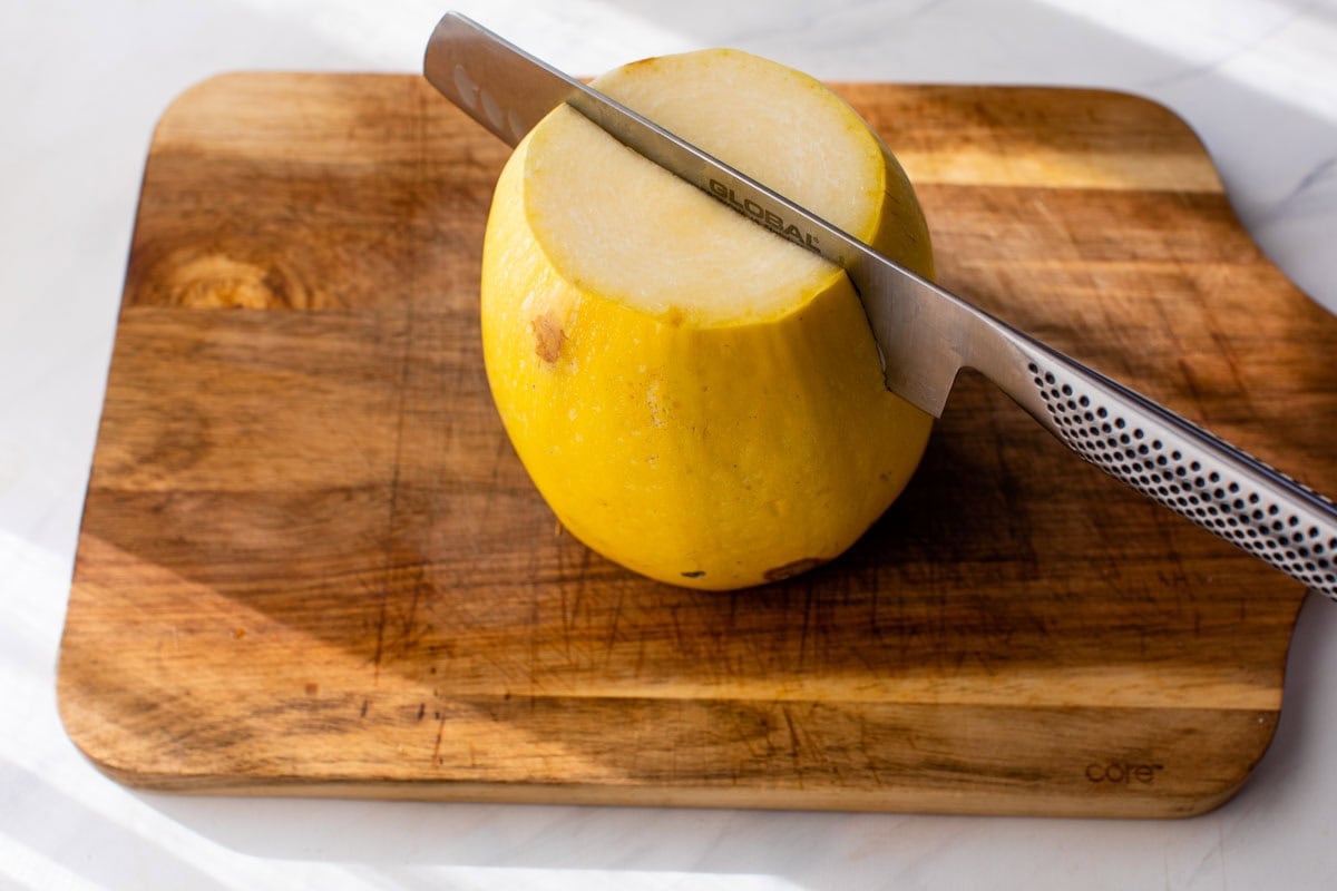 Cut the spaghetti squash in half