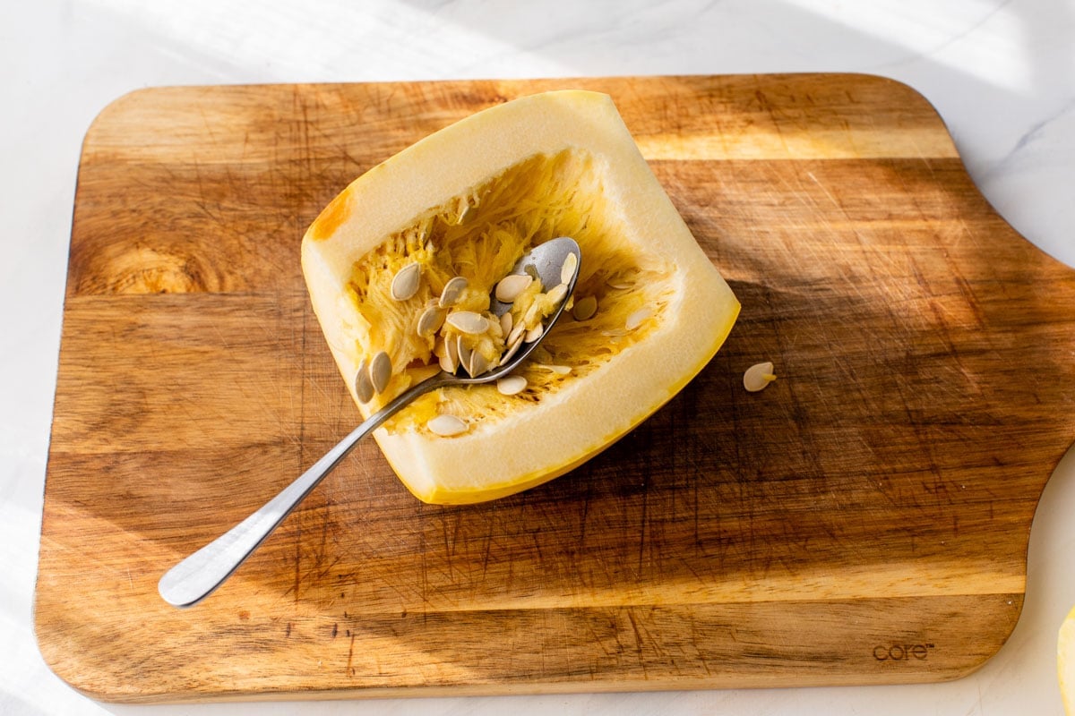 Remove the seeds and pulp from half of the spaghetti squash.