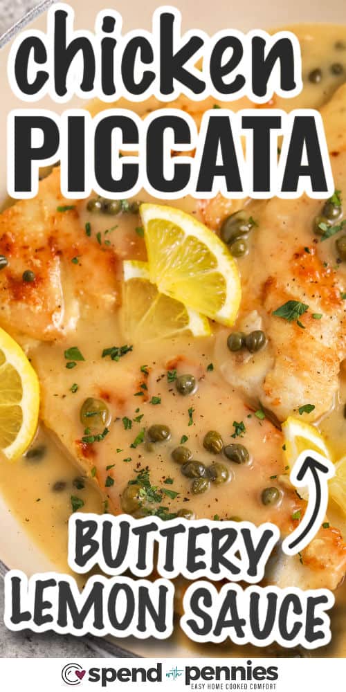 Close-up of chicken picatta in a pan with lemon slices and capers with writing