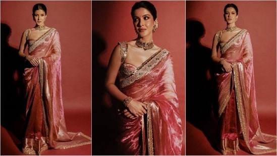 Shanaya Kapoor's saree oozes elegance with its pink organza fabric embellished with golden borders. Paired with a matching bralette-style blouse and choker, she looked simply stunning. (Instagram)