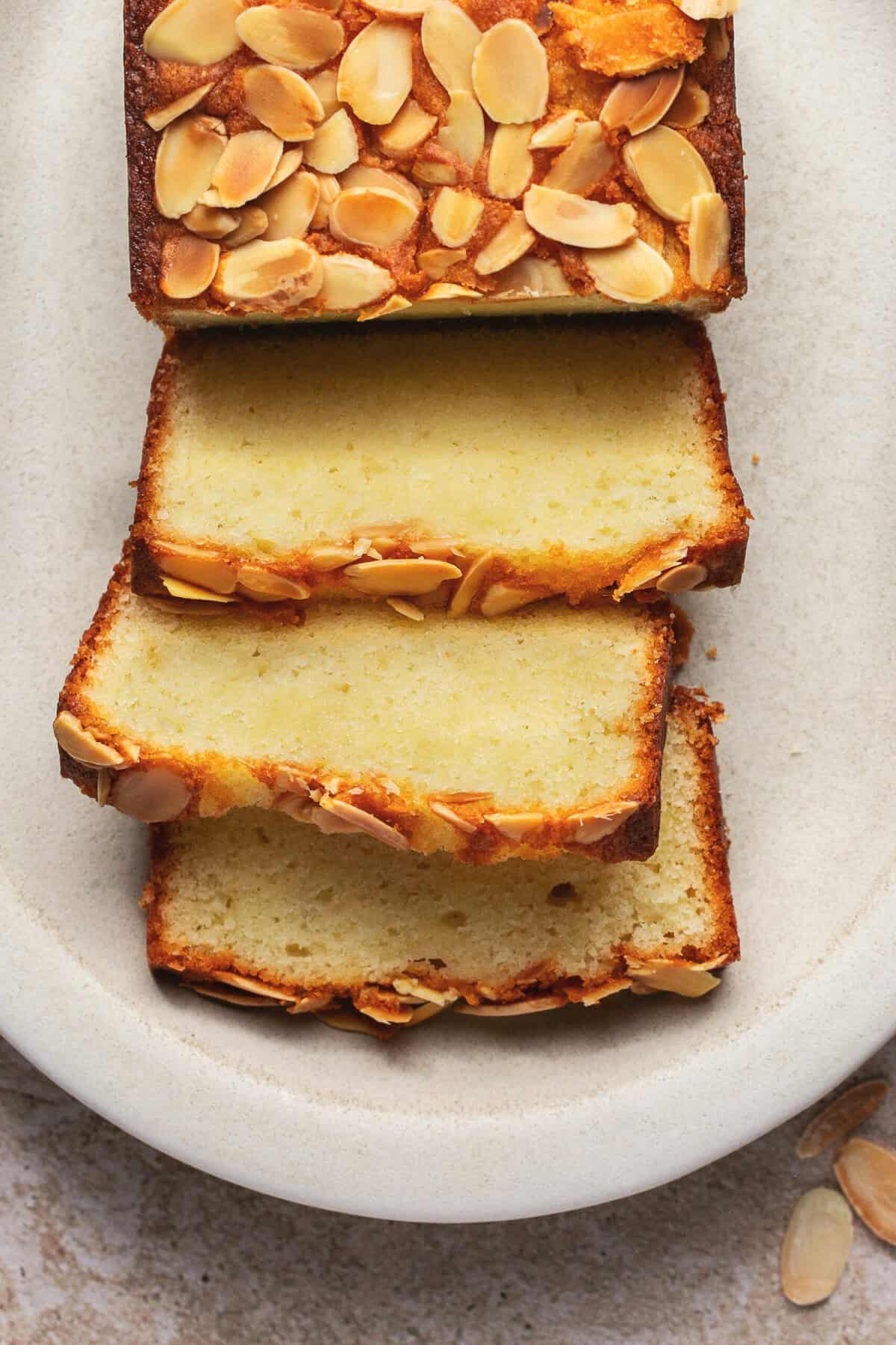 Sliced ​​almond cake on a tray