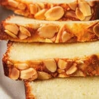 Sliced ​​almond cake with flaked almonds on top