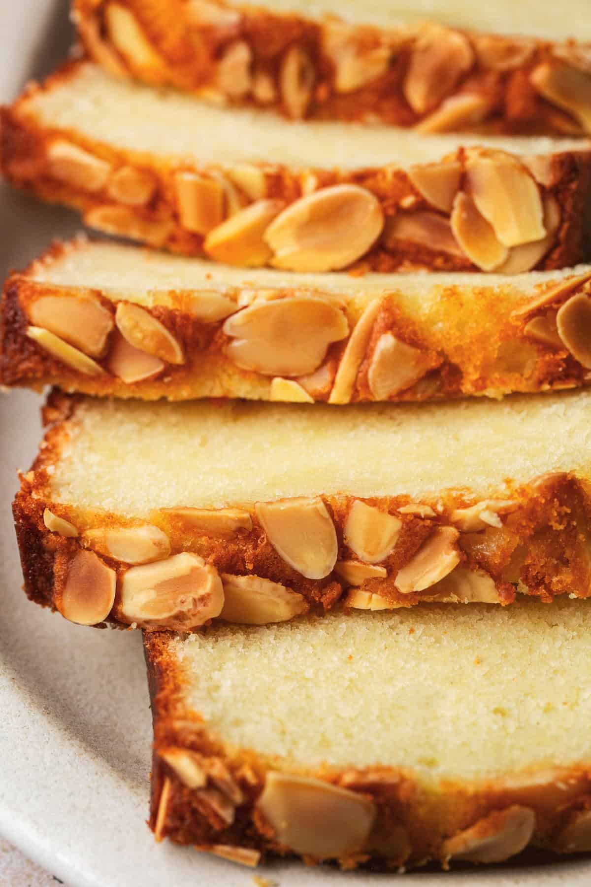 Sliced ​​almond cake with flaked almonds on top 