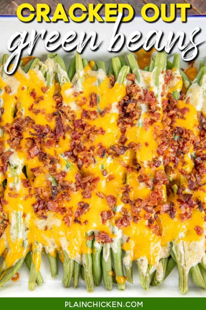 Baking dish with green beans topped with cheddar cheese and bacon with text overlay